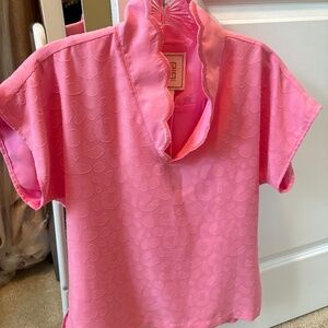 Emily McCarthy pink top